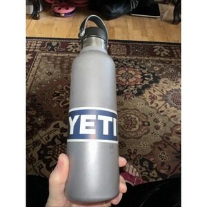 Hydroflask gray stainless steel water bottle with Yeti Sticker And Others
